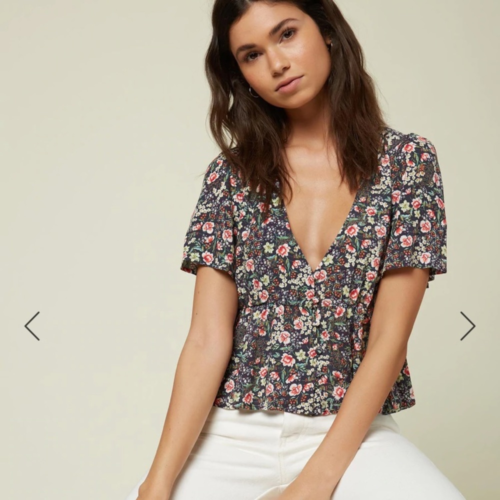 Brand new, with tag. Floral O’Neill top
